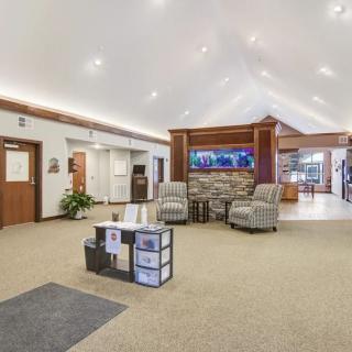 A spacious lobby with comfortable seating and a welcoming atmosphere.