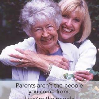 A joyful moment between a mother and daughter embracing each other.