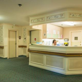 A view of a reception desk in a lobby or office setting.