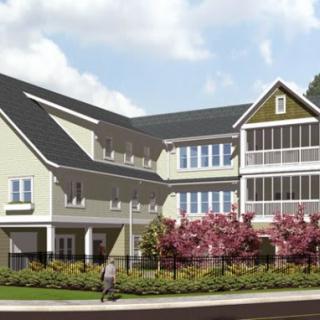 A residential house with a landscaped garden in spring.