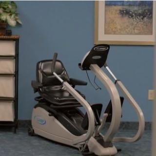 A recumbent exercise bike placed in a room for indoor workouts.