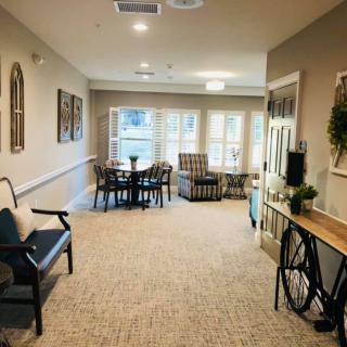 A cozy living room with comfortable seating and warm decor.