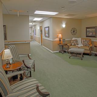 A cozy lobby area with seating and soft lighting.