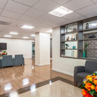 A modern lobby with comfortable seating and decorative elements.