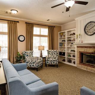Cozy living room with a fireplace and comfortable seating.