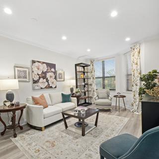A modern living room featuring stylish furniture and elegant decor.
