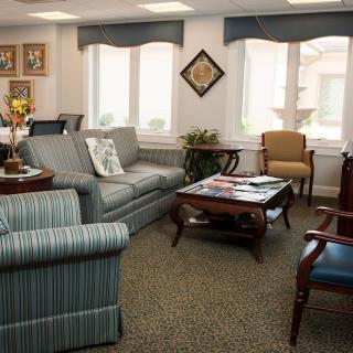 A cozy living room with comfortable seating and tasteful decor.