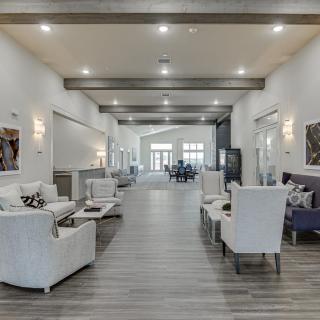 A spacious and modern lobby with elegant seating areas and contemporary decor.
