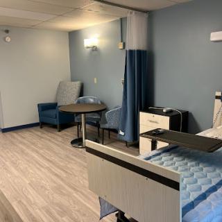 A clean and modern hospital room equipped for patient care.
