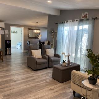 A modern living room with stylish furniture and decor.
