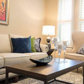 A cozy living room with elegant decor and natural lighting.