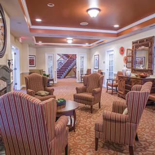 A cozy living room with comfortable seating and warm decor.