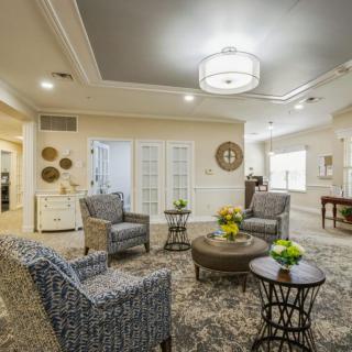 A stylish living room with comfortable armchairs and elegant decor.