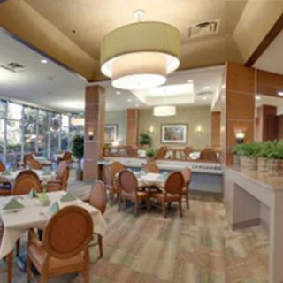 A modern restaurant dining area with elegant decor and ample seating.
