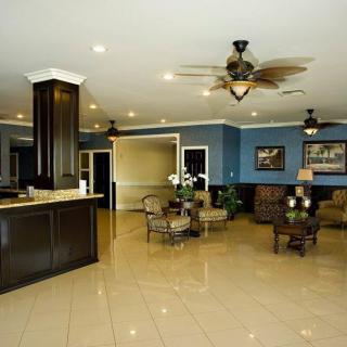 A spacious lobby with comfortable seating and elegant decor.