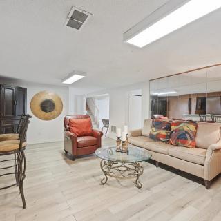 A cozy living room featuring comfortable seating and stylish decor.