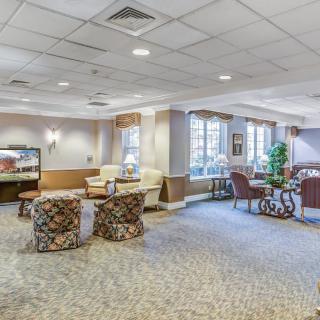 A spacious and well-lit lobby area with comfortable seating and modern decor.