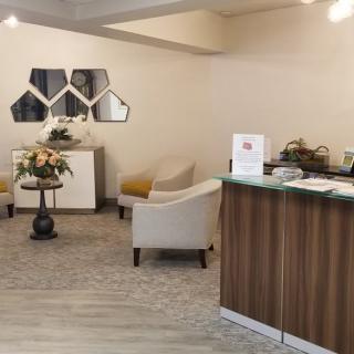 A modern reception area with comfortable seating and stylish decor.