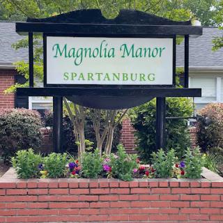 Welcome sign for Magnolia Manor located in Spartanburg.