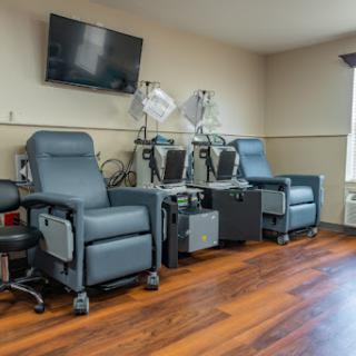 Comfortable treatment chairs in a modern healthcare facility.