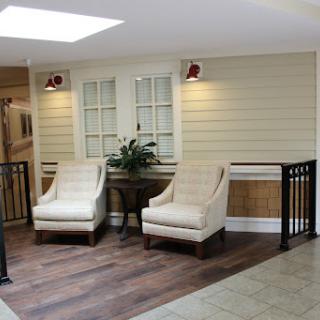 A cozy seating area featuring two elegant chairs, perfect for relaxation and conversation.