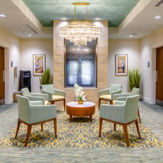 A stylish lobby featuring comfortable seating and modern decor.