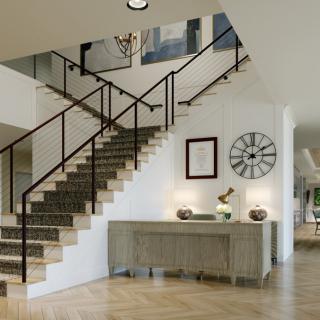 A modern home interior featuring a stylish staircase with a console table and wall clock.