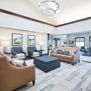 A modern living room with stylish furniture and elegant decor.