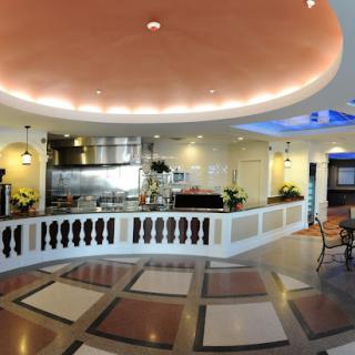A modern restaurant interior featuring stylish design and ambient lighting.