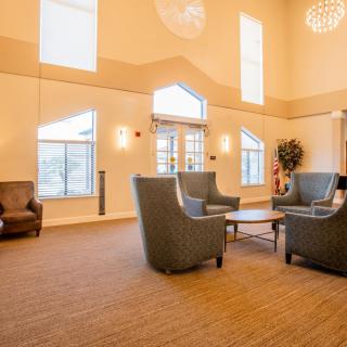 Spacious lobby with comfortable seating and natural lighting.