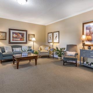 A cozy living room with comfortable seating and tasteful decor.