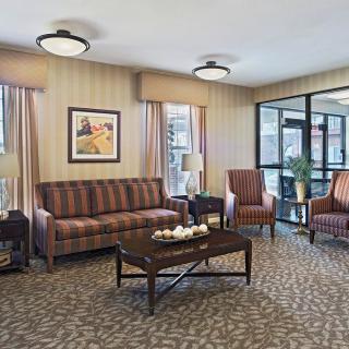A cozy living room with comfortable seating and warm decor.