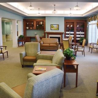 A cozy living room with comfortable seating and elegant interior design.