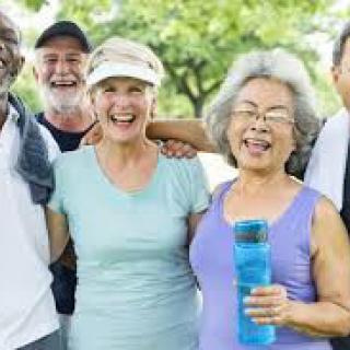 A group of seniors enjoying an active day outdoors together.