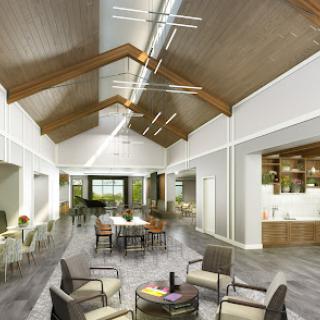 A contemporary community space featuring large windows and wooden beams, designed for gatherings and social activities.