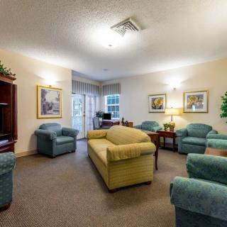 A cozy living room with comfortable seating and tasteful decor.