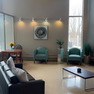 A stylish and modern lounge area featuring comfortable seating and contemporary decor.