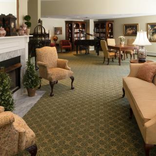 Cozy living room with a fireplace and comfortable seating area.