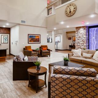 A modern lobby with comfortable seating and stylish decor.