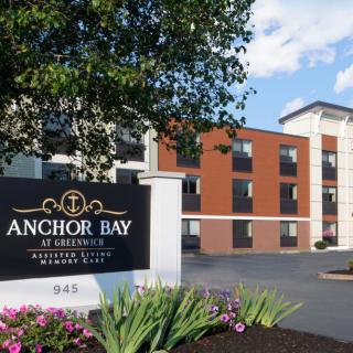 The exterior view of Anchor Bay with lush landscaping.