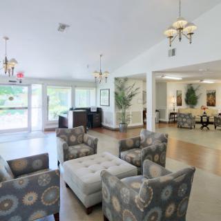 A spacious and inviting lobby area with contemporary furnishings and ample natural light.