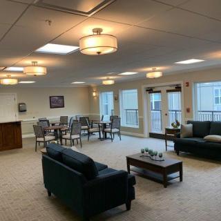 Spacious living room with comfortable seating and natural light.