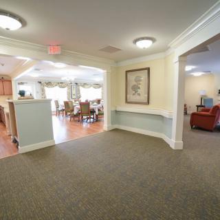 A spacious and inviting interior featuring a living room and dining area with elegant decor and comfortable seating.