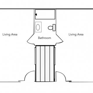A simple floor plan showing a central bathroom flanked by two living areas.