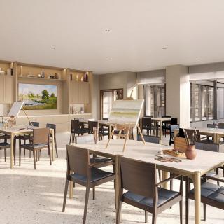 A modern dining area with neatly arranged tables and chairs, featuring a bar and abundant natural light.