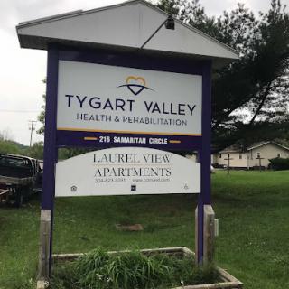 Sign for Tygart Valley Health and Rehabilitation, featuring Laurel View Apartments.