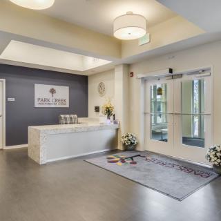 A modern reception area with a sleek desk and welcoming decor.