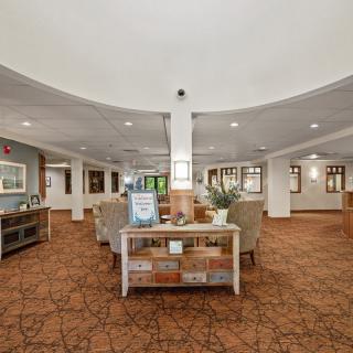 Spacious hotel lobby with comfortable seating and modern decor.