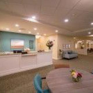 A modern and spacious reception area with a seating arrangement.