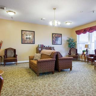 A cozy living room with comfortable seating and warm decor.
